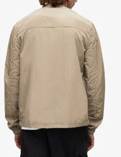 AllSaints Cali Ramskull-embroidered Recycled-polyamide Jacket 10 AllSaints Cali Ramskull-embroidered Recycled-polyamide Jacket -Selfidges Launches R04080477 EARTHYBROWN ALT03