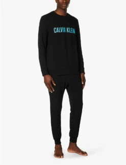 Calvin Klein Branded-waistband Tapered-leg Cotton-blend Jogging Bottoms 8 Calvin Klein Branded-waistband Tapered-leg Cotton-blend Jogging Bottoms -Selfidges Launches R04123663 BLACKSIGNATUREBLUE ALT01
