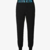 Calvin Klein Branded-waistband Tapered-leg Cotton-blend Jogging Bottoms 1 Calvin Klein Branded-waistband Tapered-leg Cotton-blend Jogging Bottoms -Selfidges Launches R04123663 BLACKSIGNATUREBLUE M