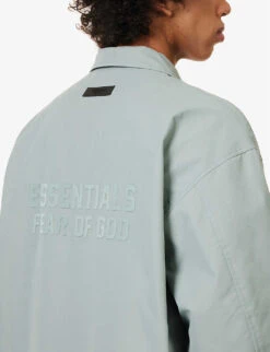 ESSENTIALS Brand-print Relaxed-fit Cotton-blend Coat -Selfidges Launches R04126222 SYCAMORE ALT04