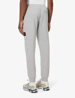 Stone Island Brand-patch Zip-pocket Cotton-jersey Jogging Bottoms -Selfidges Launches R04188791 MELANGEGREY ALT03