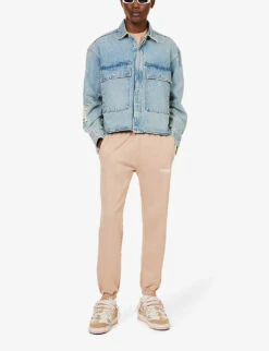 Represent Owners' Club Text-print Relaxed-fit Cotton-jersey Jogging Bottoms -Selfidges Launches R04195312 STUCCO ALT01