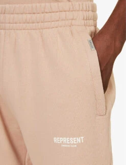 Represent Owners' Club Text-print Relaxed-fit Cotton-jersey Jogging Bottoms -Selfidges Launches R04195312 STUCCO ALT04