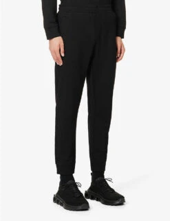 Emporio Armani Logo-print Tapered-leg Mid-rise Jersey Jogging Bottoms -Selfidges Launches R04196970 NERO ALT02