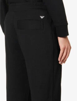 Emporio Armani Logo-print Tapered-leg Mid-rise Jersey Jogging Bottoms -Selfidges Launches R04196970 NERO ALT04